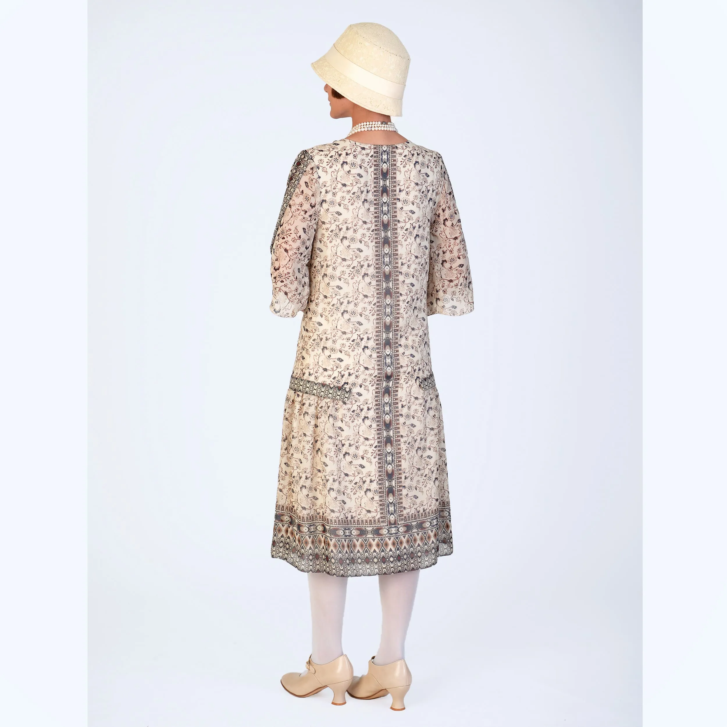 1920s chiffon high tea dress in printed cream with elbow sleeves