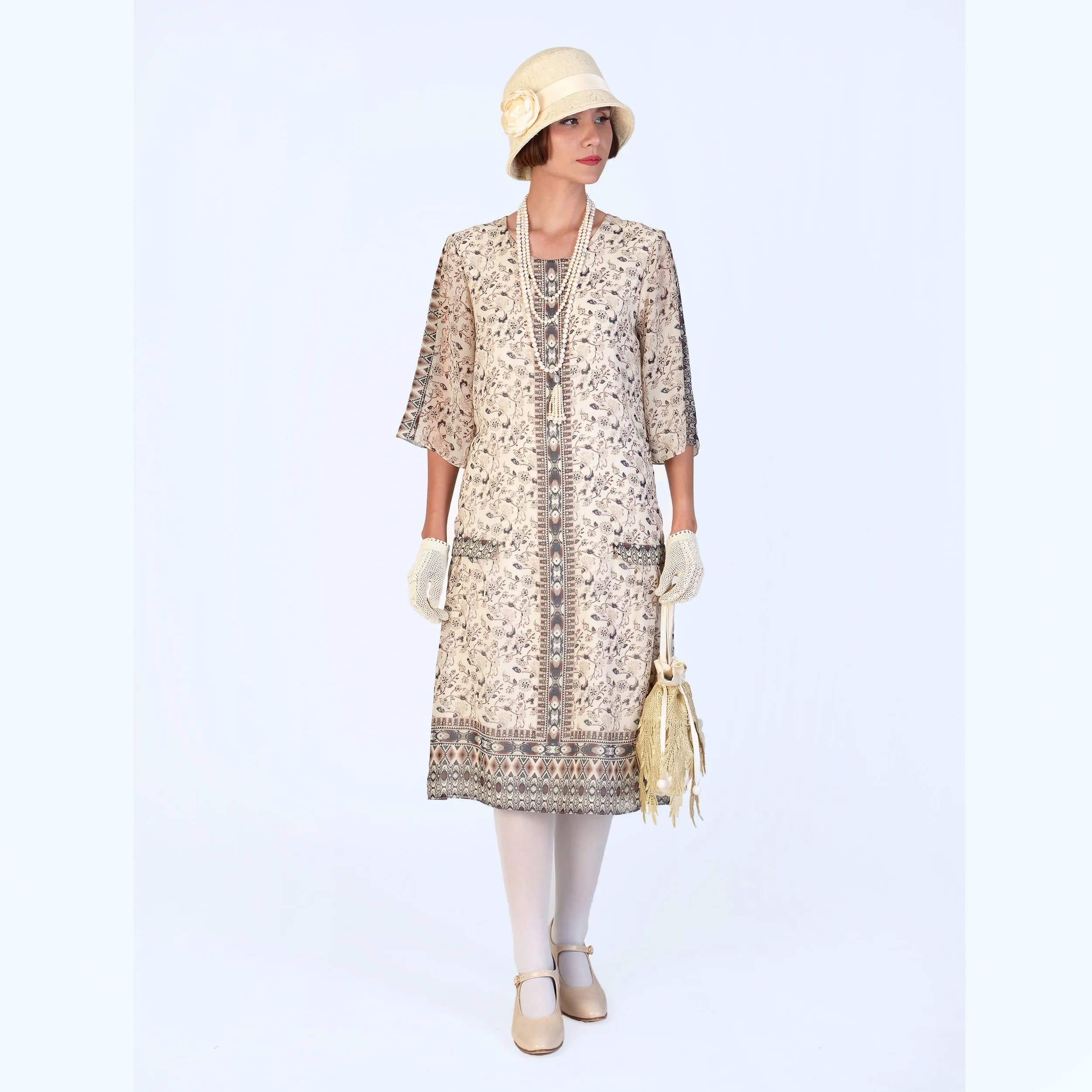 1920s chiffon high tea dress in printed cream with elbow sleeves