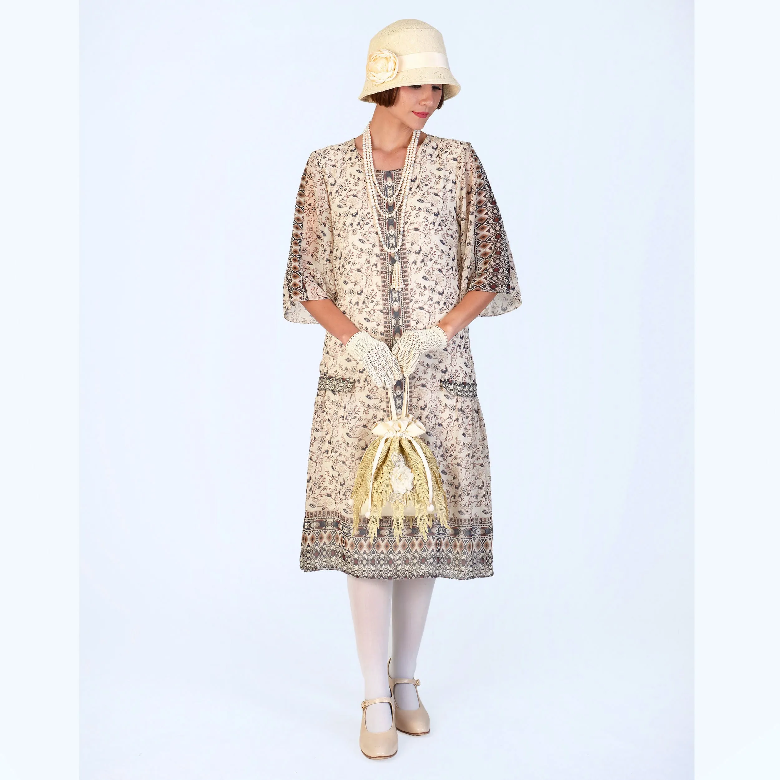 1920s chiffon high tea dress in printed cream with elbow sleeves