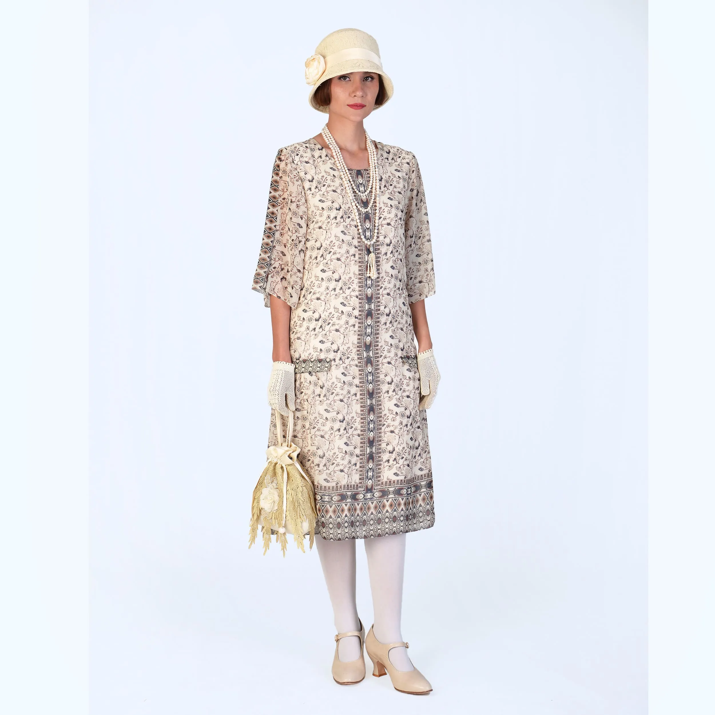 1920s chiffon high tea dress in printed cream with elbow sleeves